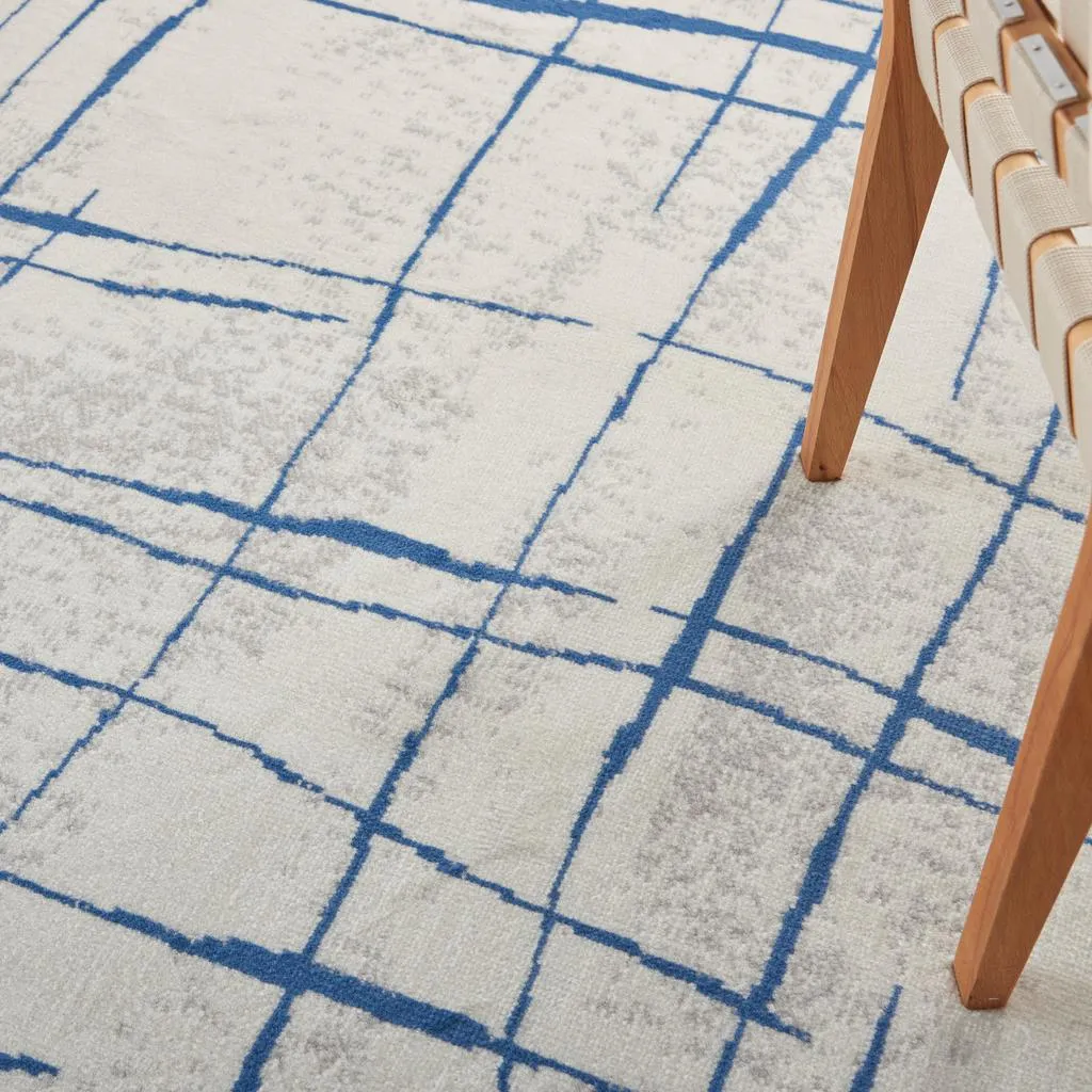 5’ x 7’ Ivory and Blue Irregular Grids Area Rug