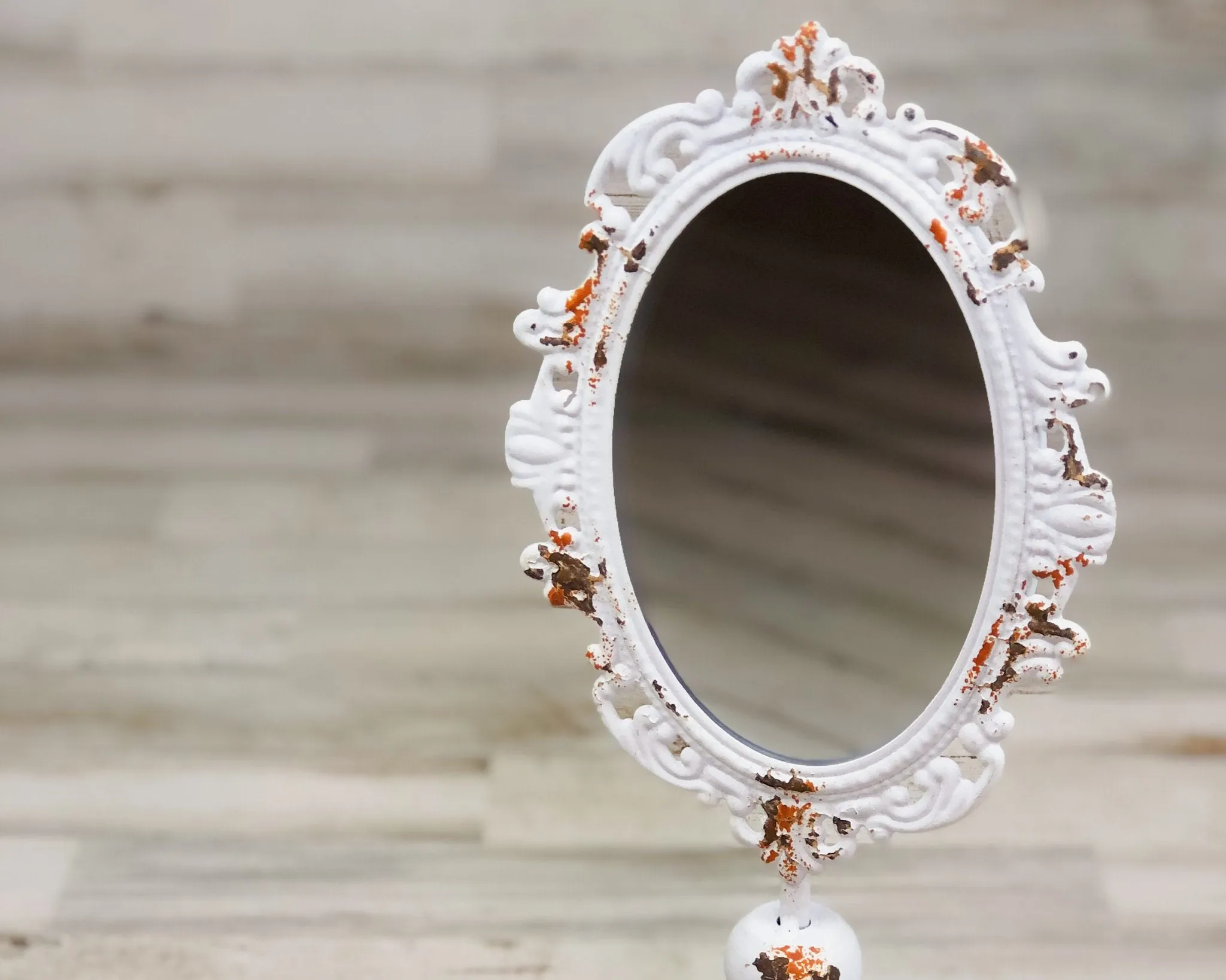 Chippy distressed white ornate pedestal mirror
