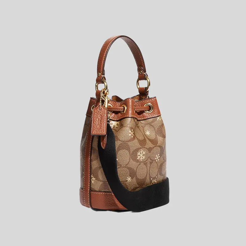 COACH Dempsey Drawstring Bucket Bag 15 In Signature Canvas With Snowflake Print Khaki Multi RS-CE587