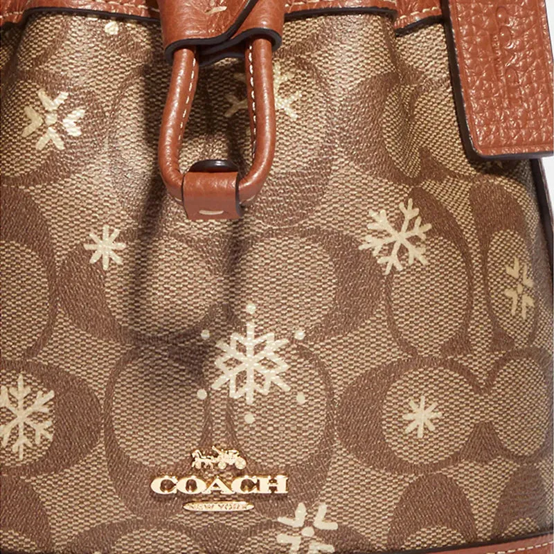 COACH Dempsey Drawstring Bucket Bag 15 In Signature Canvas With Snowflake Print Khaki Multi RS-CE587