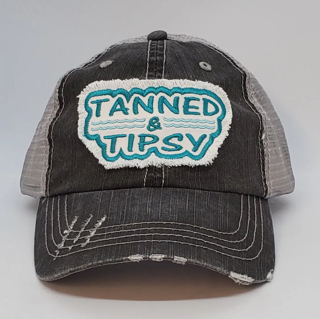 Tanned and Tipsy (frayed patch)