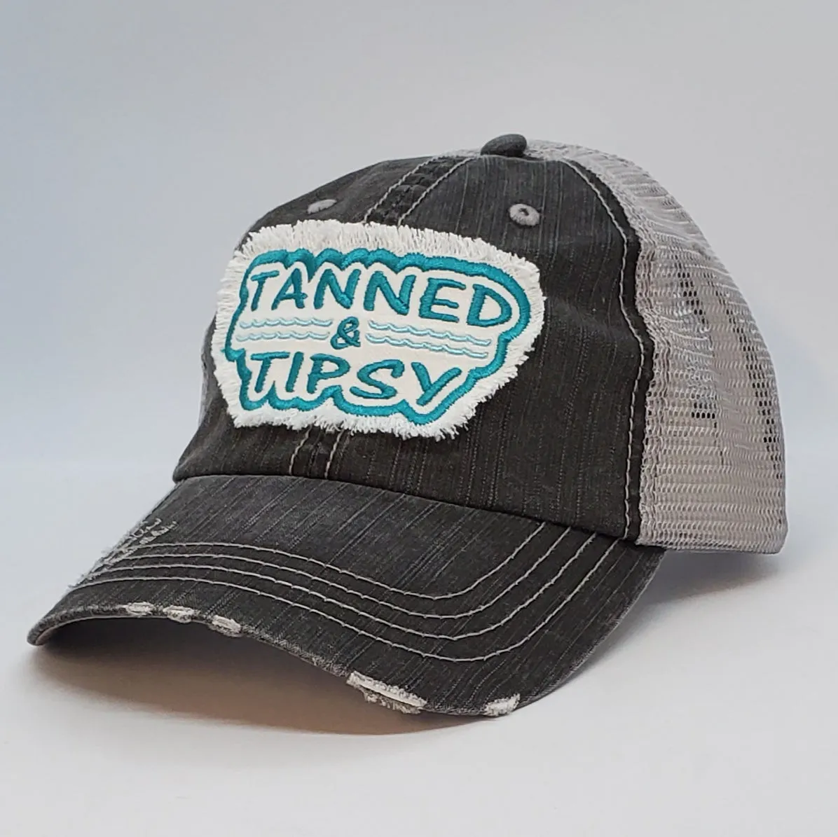 Tanned and Tipsy (frayed patch)